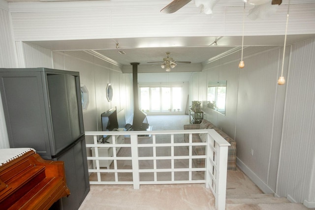 114 Bordeaux St, North Augusta, SC 29841 - stairs featuring a ceiling fan, carpet, a wood stove, and crown molding