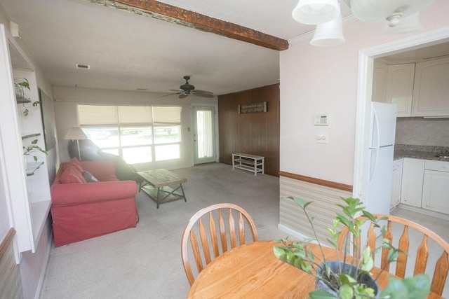 114 Bordeaux St, North Augusta, SC 29841 - dining area featuring light carpet, ceiling fan, and beamed ceiling
