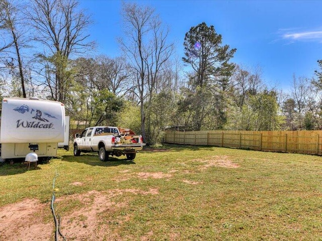 view of yard with fence