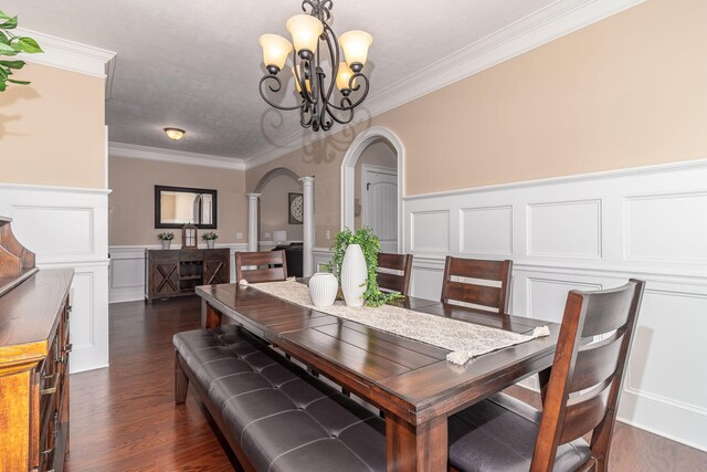 4092 Starview Ln, Evans, GA 30809 - dining area with ornate columns, arched walkways, a decorative wall, a wainscoted wall, and ornamental molding