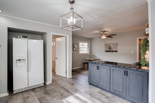 kitchen with white refrigerator with ice dispenser, a chandelier, light wood-type flooring, a ceiling fan, and baseboards