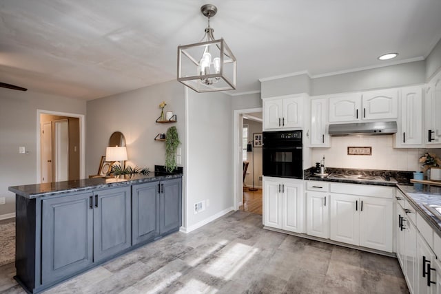 kitchen with oven, under cabinet range hood, white cabinetry, a peninsula, and a chandelier