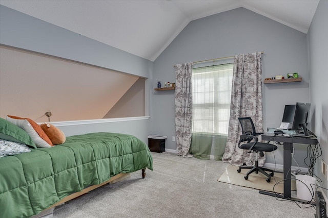 bedroom with carpet flooring, vaulted ceiling, and baseboards