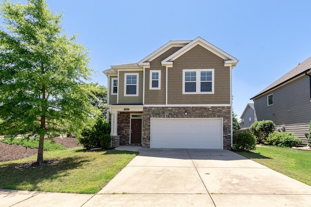 5465 Everlook Cir, Evans, GA 30809 - craftsman-style house with stone siding, an attached garage, concrete driveway, and a front yard