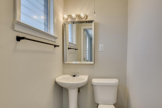 bathroom featuring toilet