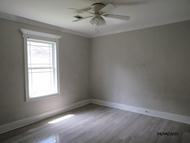 1937 Haynie Dr, Augusta, GA 30904 - empty room featuring baseboards, crown molding, visible vents, ceiling fan, and wood finished floors