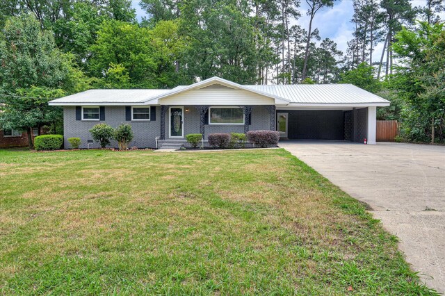 1116 Northwood Rd, Augusta, GA 30909 - ranch-style home featuring an attached carport, driveway, brick siding, a metal roof, and crawl space