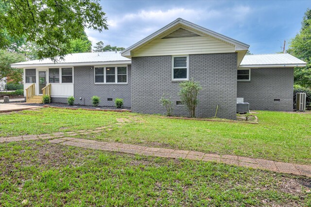 1116 Northwood Rd, Augusta, GA 30909 - back of property featuring crawl space, brick siding, and a lawn
