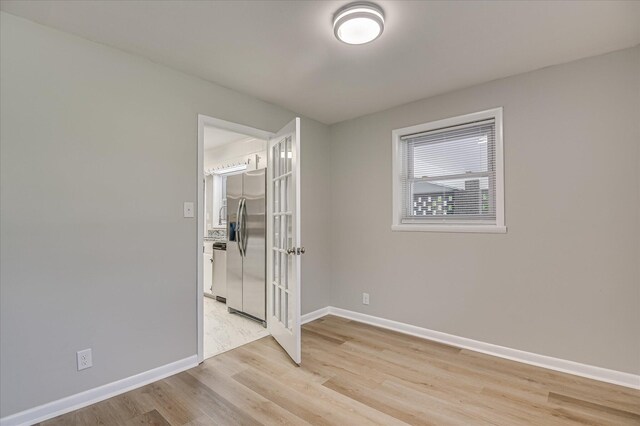 1116 Northwood Rd, Augusta, GA 30909 - spare room with light wood-style floors and french doors