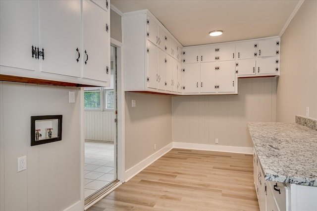 1116 Northwood Rd, Augusta, GA 30909 - kitchen with white cabinets, light wood-style floors, and light countertops