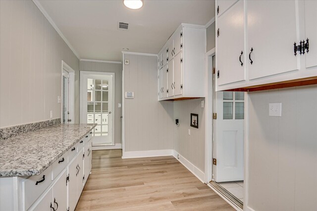 1116 Northwood Rd, Augusta, GA 30909 - washroom with light wood-type flooring, cabinet space, crown molding, and washer hookup