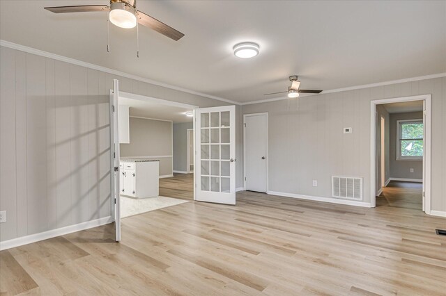 1116 Northwood Rd, Augusta, GA 30909 - spare room with ceiling fan, ornamental molding, light wood finished floors, and french doors