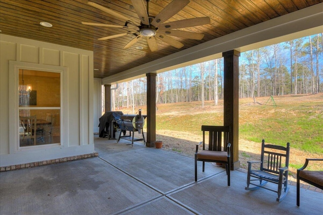 view of patio with ceiling fan and grilling area