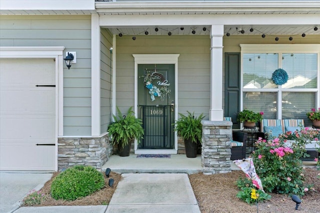 doorway to property with covered porch