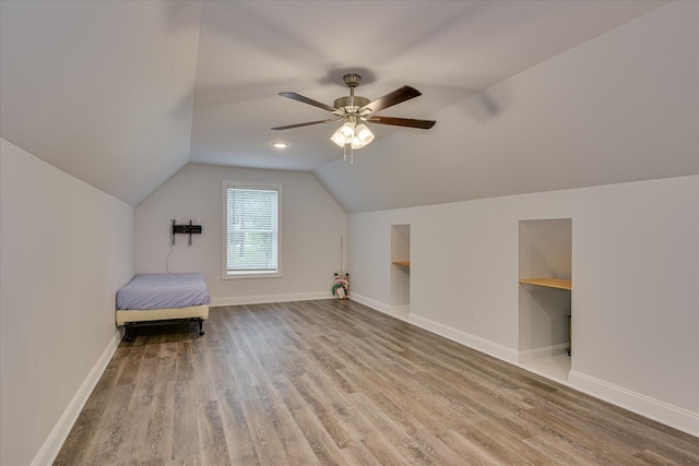 170 Grandview Dr, Mccormick, SC 29835 - unfurnished bedroom featuring vaulted ceiling, wood finished floors, baseboards, and a ceiling fan