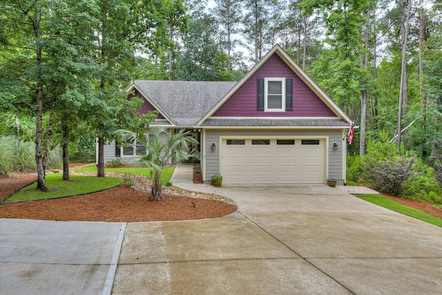 170 Grandview Dr, Mccormick, SC 29835 - view of front of home featuring driveway, a shingled roof, and a garage