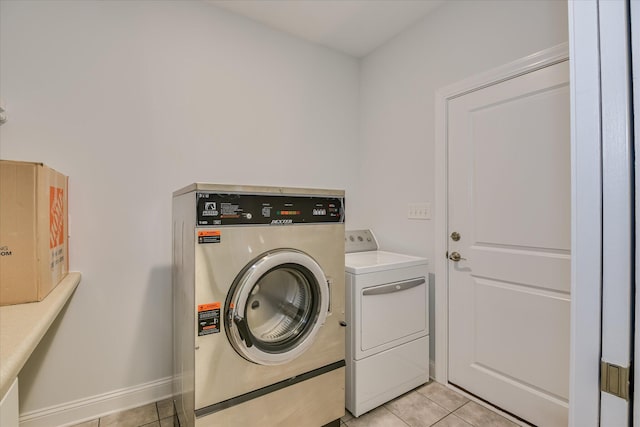 170 Grandview Dr, Mccormick, SC 29835 - laundry room with light tile patterned flooring, independent washer and dryer, and baseboards
