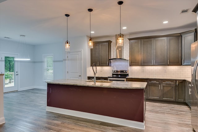 170 Grandview Dr, Mccormick, SC 29835 - kitchen featuring stainless steel appliances, wall chimney range hood, a sink, and backsplash