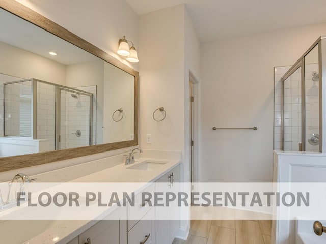 bathroom featuring vanity and walk in shower