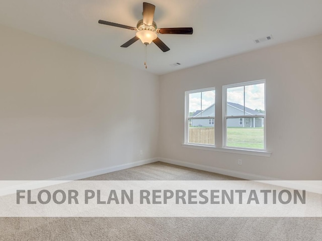 carpeted empty room featuring ceiling fan