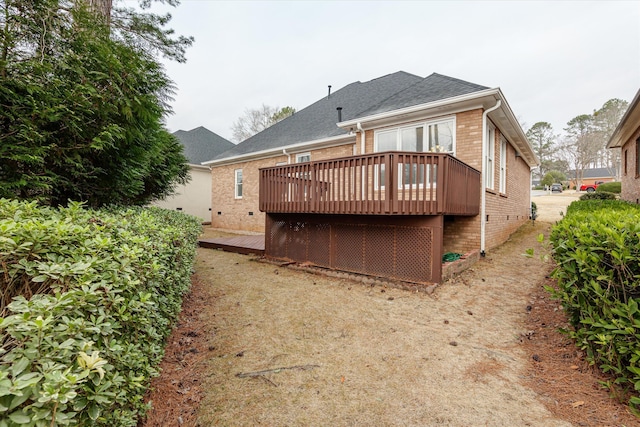 rear view of house with a deck