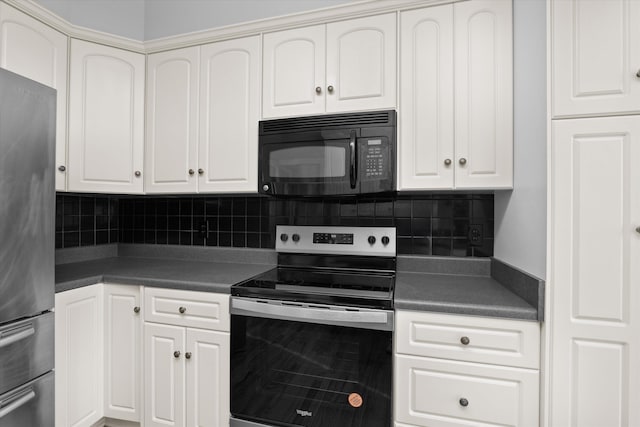 kitchen with appliances with stainless steel finishes, white cabinets, and backsplash