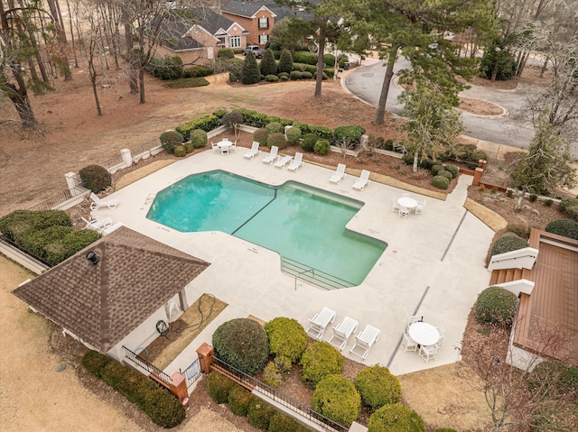 view of swimming pool with a patio