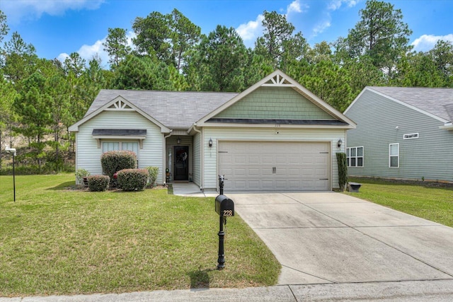 view of front facade with a front lawn and a garage