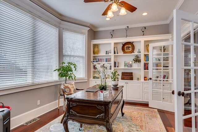 office area with french doors, ornamental molding, a ceiling fan, wood finished floors, and baseboards