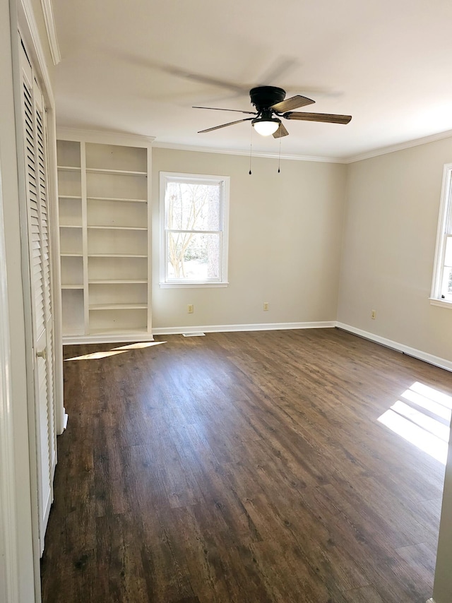 1014 Walnut St, Louisville, GA 30434 - spare room with dark wood-style floors, baseboards, a ceiling fan, and crown molding