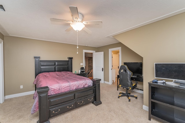 bedroom featuring ceiling fan, baseboards, visible vents, and carpet floors