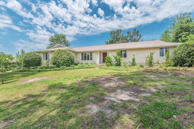 3411 Kamel Cir, Augusta, GA 30909 - ranch-style home with a front lawn and brick siding