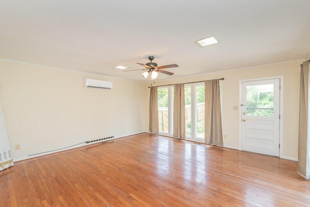 3411 Kamel Cir, Augusta, GA 30909 - spare room with a wall mounted AC, crown molding, a ceiling fan, light wood-style floors, and baseboards