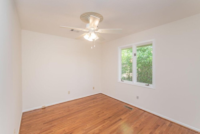 3411 Kamel Cir, Augusta, GA 30909 - empty room with wood finished floors, baseboards, and ceiling fan