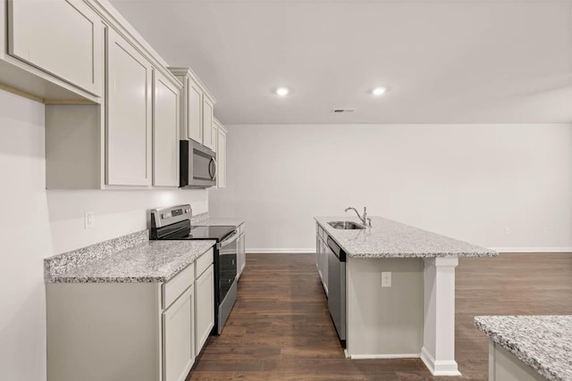 3445 Firestone Dr, Hephzibah, GA 30815 - kitchen featuring stainless steel appliances, baseboards, dark wood-style floors, and a sink
