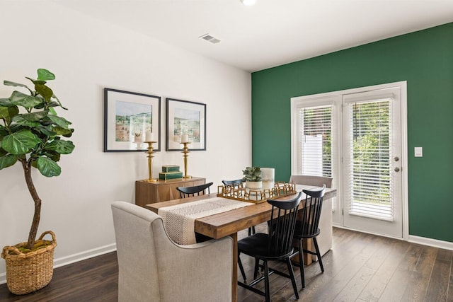 3445 Firestone Dr, Hephzibah, GA 30815 - dining room with baseboards, dark wood-style flooring, and visible vents