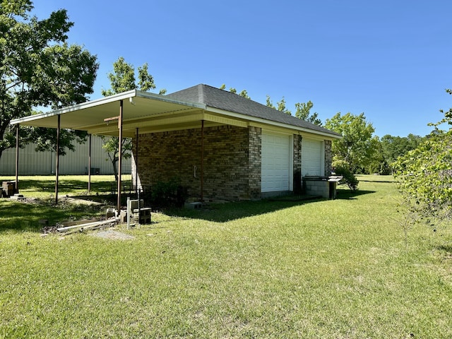 view of home's exterior featuring a yard and brick siding
