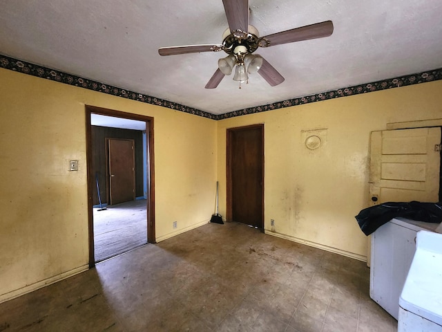 unfurnished room featuring tile patterned floors, baseboards, and ceiling fan