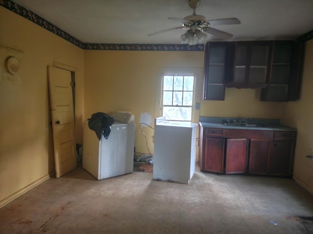 interior space with a sink and ceiling fan