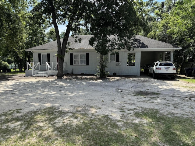 2402 Wheeless Rd, Augusta, GA 30906 - single story home with a carport, driveway, and a shingled roof