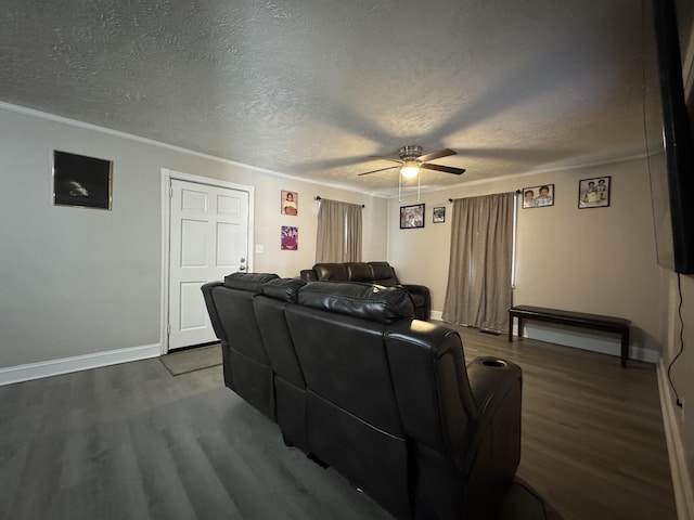 2402 Wheeless Rd, Augusta, GA 30906 - home theater featuring dark wood-style flooring, ceiling fan, a textured ceiling, and ornamental molding