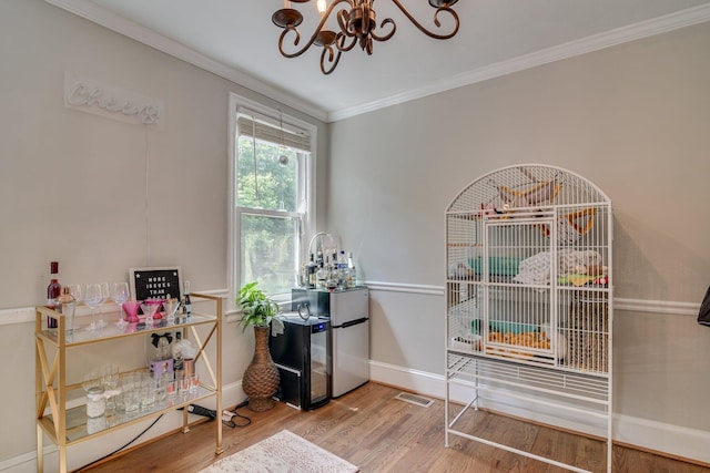 1703 Holly Hill Rd, Augusta, GA 30904 - office with a chandelier, wood finished floors, ornamental molding, and baseboards