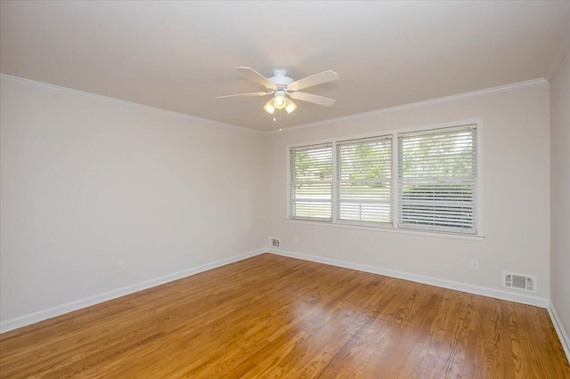 2924 Stratford Dr, Augusta, GA 30909 - spare room with a ceiling fan, light wood-style floors, and ornamental molding