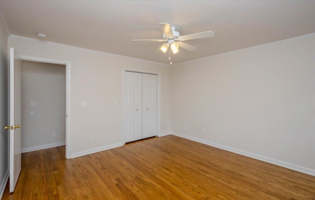 2924 Stratford Dr, Augusta, GA 30909 - unfurnished bedroom featuring wood finished floors, a closet, ornamental molding, and ceiling fan
