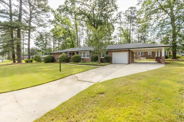2924 Stratford Dr, Augusta, GA 30909 - ranch-style house with brick siding, an attached garage, concrete driveway, and a front lawn