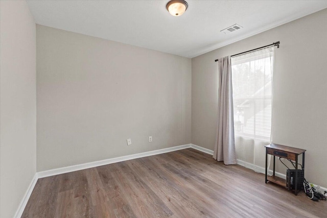 3382 Grove Landing Cir, Grovetown, GA 30813 - unfurnished room featuring wood finished floors and baseboards
