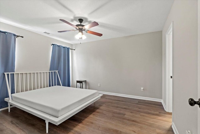 3382 Grove Landing Cir, Grovetown, GA 30813 - bedroom with wood finished floors and a ceiling fan