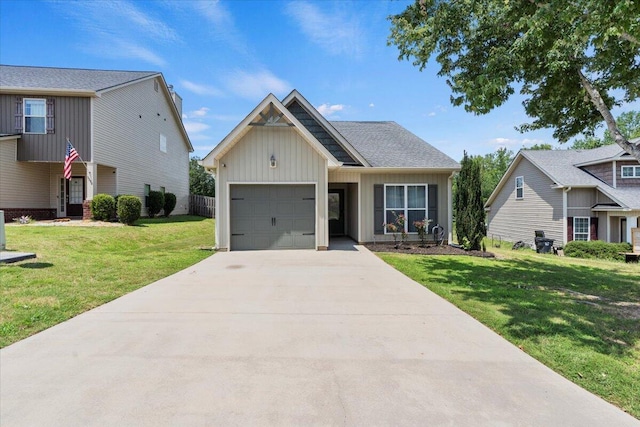 3382 Grove Landing Cir, Grovetown, GA 30813 - view of front of property with board and batten siding, a garage, a front lawn, and driveway