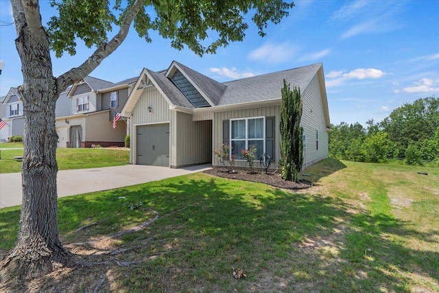 3382 Grove Landing Cir, Grovetown, GA 30813 - view of front of home with an attached garage, driveway, board and batten siding, and a front lawn
