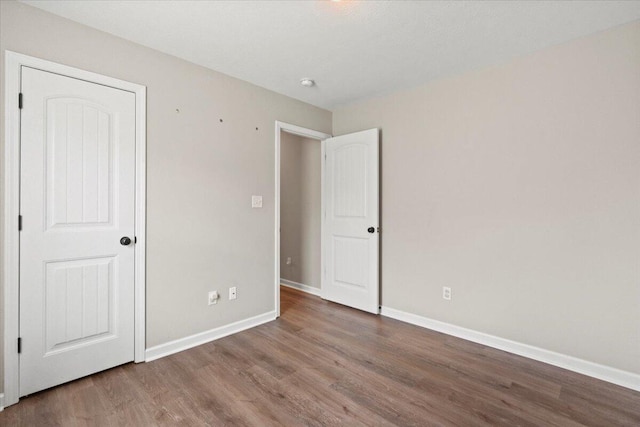 3382 Grove Landing Cir, Grovetown, GA 30813 - unfurnished bedroom featuring wood finished floors